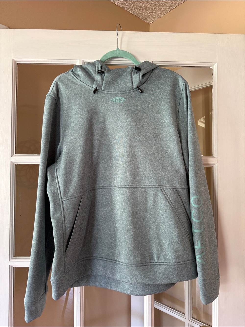 Reel Legends Men's Heather Teal Pullover Hoodie